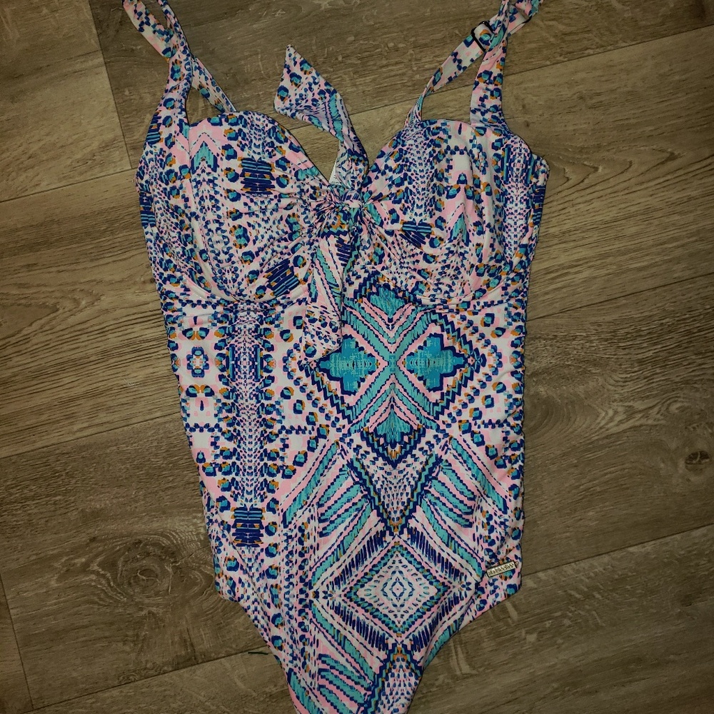 Gorgeous multi color swimsuit. Great quality.